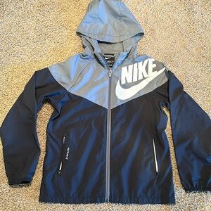 Boys Nike Sportswear Windrunner. Medium. Like new. Clean. Very thin material.